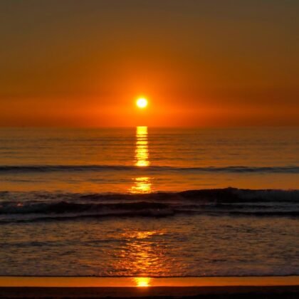 Beach sunset over clean ocean horizon I